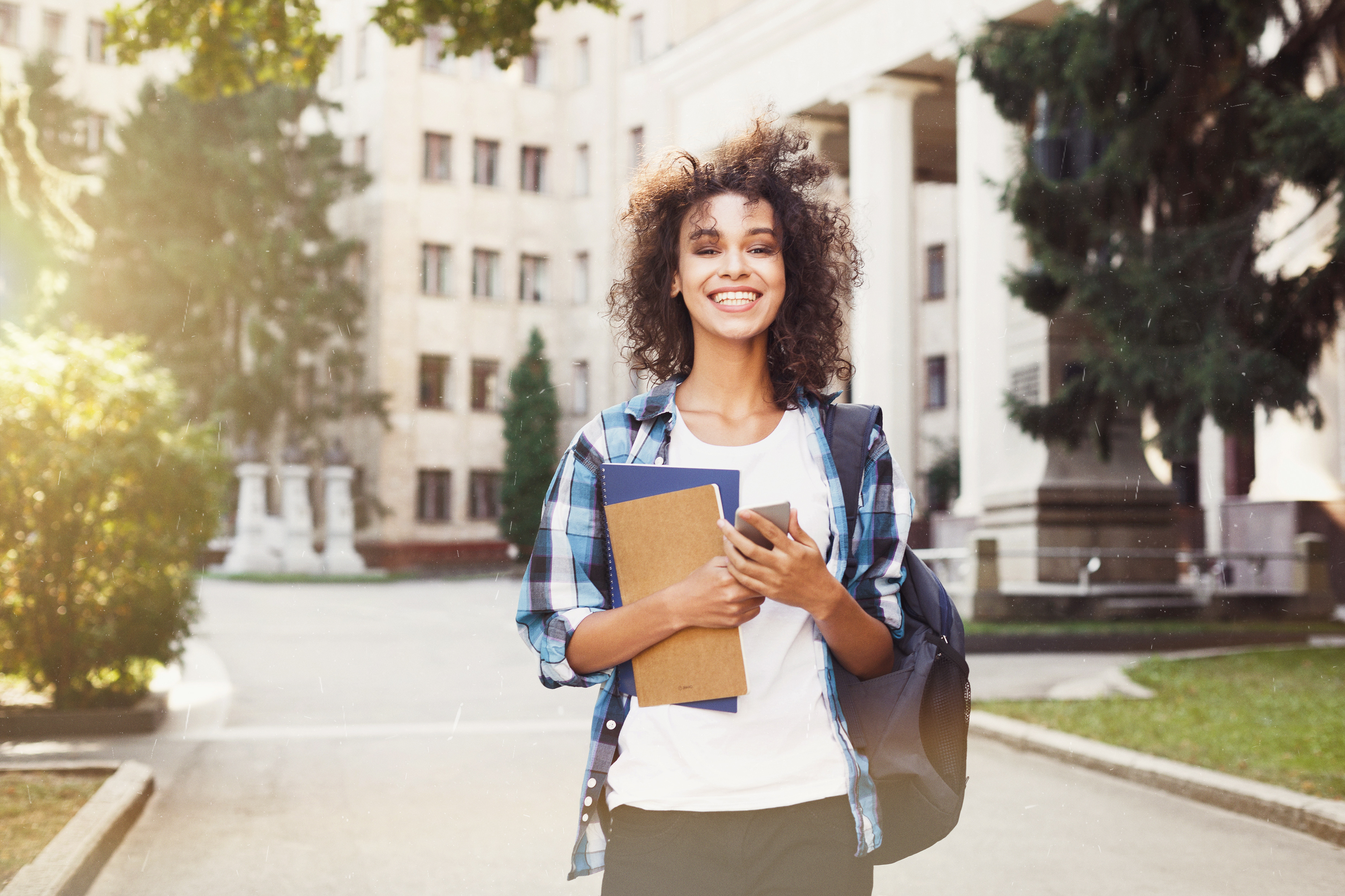Student looking toward her future on a university campus